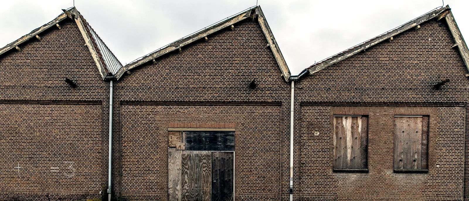 The gable end of the printworks, its loading door bricked up.